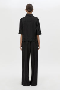 Back view CAMILLA AND MARC Chara Embroidered Relaxed Pant in Black with encased elastic waistband.