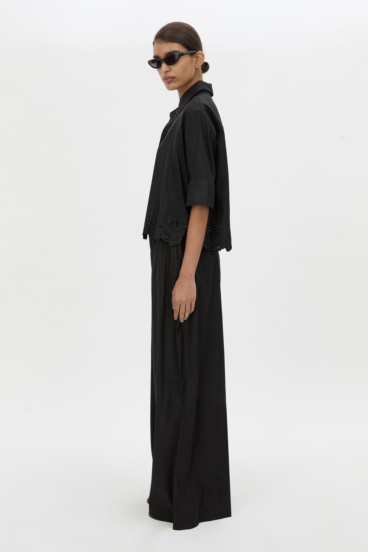 Side view CAMILLA AND MARC Chara Embroidered Relaxed Pant in Black with encased elastic waistband.