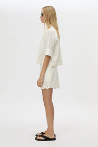 Side view CAMILLA AND MARC Chara Embroidered Short in Cream with embroidered hem, and elastic waistband.