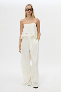 Front styled view CAMILLA AND MARC Chara Relaxed Pant in Cream with elastic waist, and back welts.