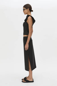 Side view CAMILLA AND MARC Chiaro Midi Skirt in black with low‑rise fit.