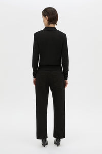 Back view CAMILLA AND MARC Chime long-sleeve merino wool knit polo top in black.
