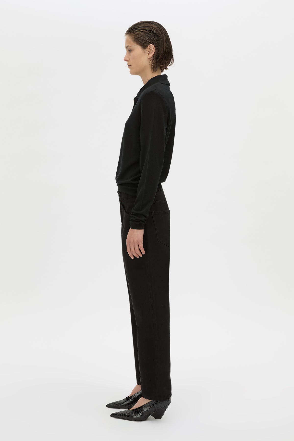 Side view CAMILLA AND MARC Chime long-sleeve merino wool knit polo top in black.