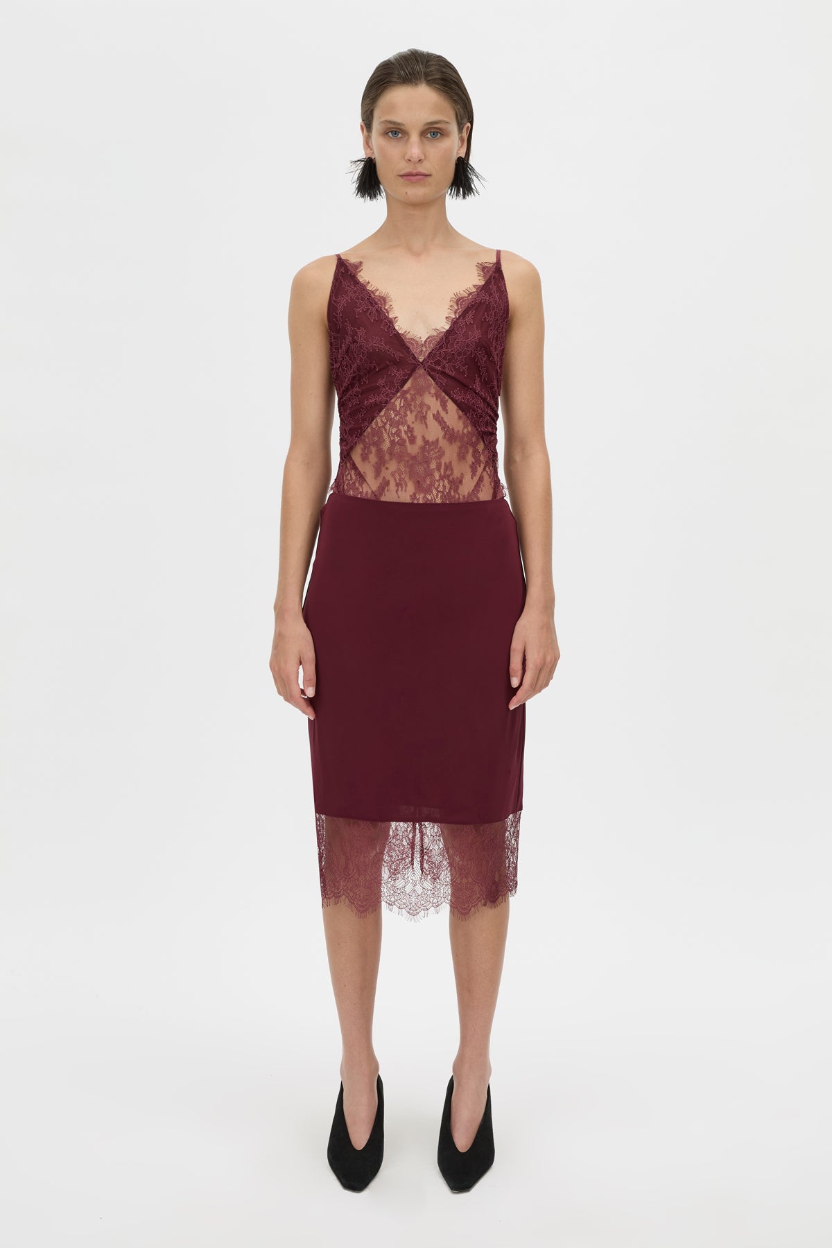 Front view CAMILLA AND MARC Cora V Neck Lace Bodysuit in burgundy with scalloped lace edges.