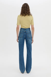 Back view CAMILLA AND MARC Dakota slim fit lemongrass top with ribbed turtle neck.