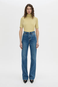 Front view CAMILLA AND MARC Dakota slim fit lemongrass top with ribbed turtle neck.