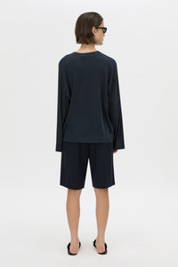 Back view CAMILLA AND MARC Dakota long sleeve top in navy.