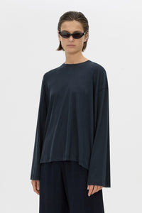 Cropped view CAMILLA AND MARC Dakota long sleeve top in navy.