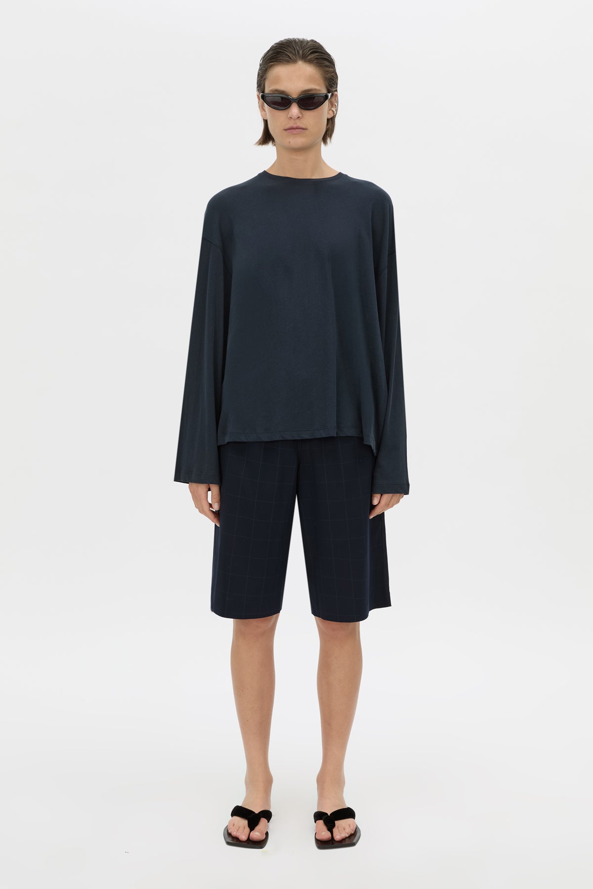 Front view CAMILLA AND MARC Dakota long sleeve top in navy.