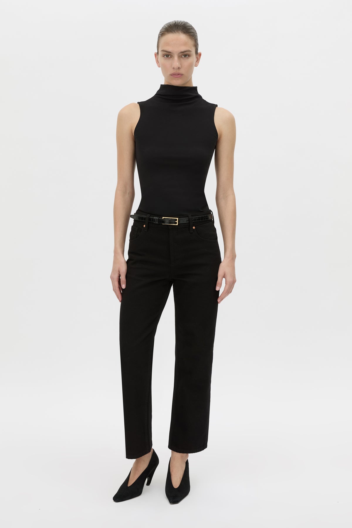 Front-styled view CAMILLA AND MARC fitted Dakota Sleeveless High Neck Top in black.