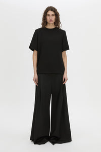 Front view CAMILLA AND MARC Darien short sleeve top in black.