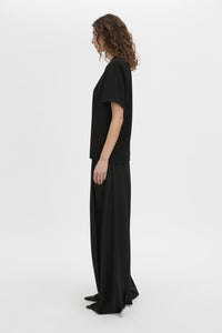 Side view CAMILLA AND MARC Darien short sleeve top in black.
