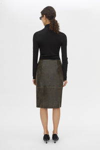 Back view CAMILLA AND MARC Dawn Leather Skirt in Black Brown with a wrap midi silhouette.