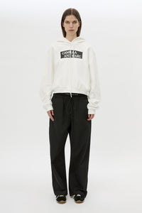 Front styled view CAMILLA AND MARC Dia Elastic Detail Pant in Black with logo detail.