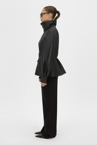 Side View - CAMILLA AND MARC Drea funnel neck puffer jacket in black. 