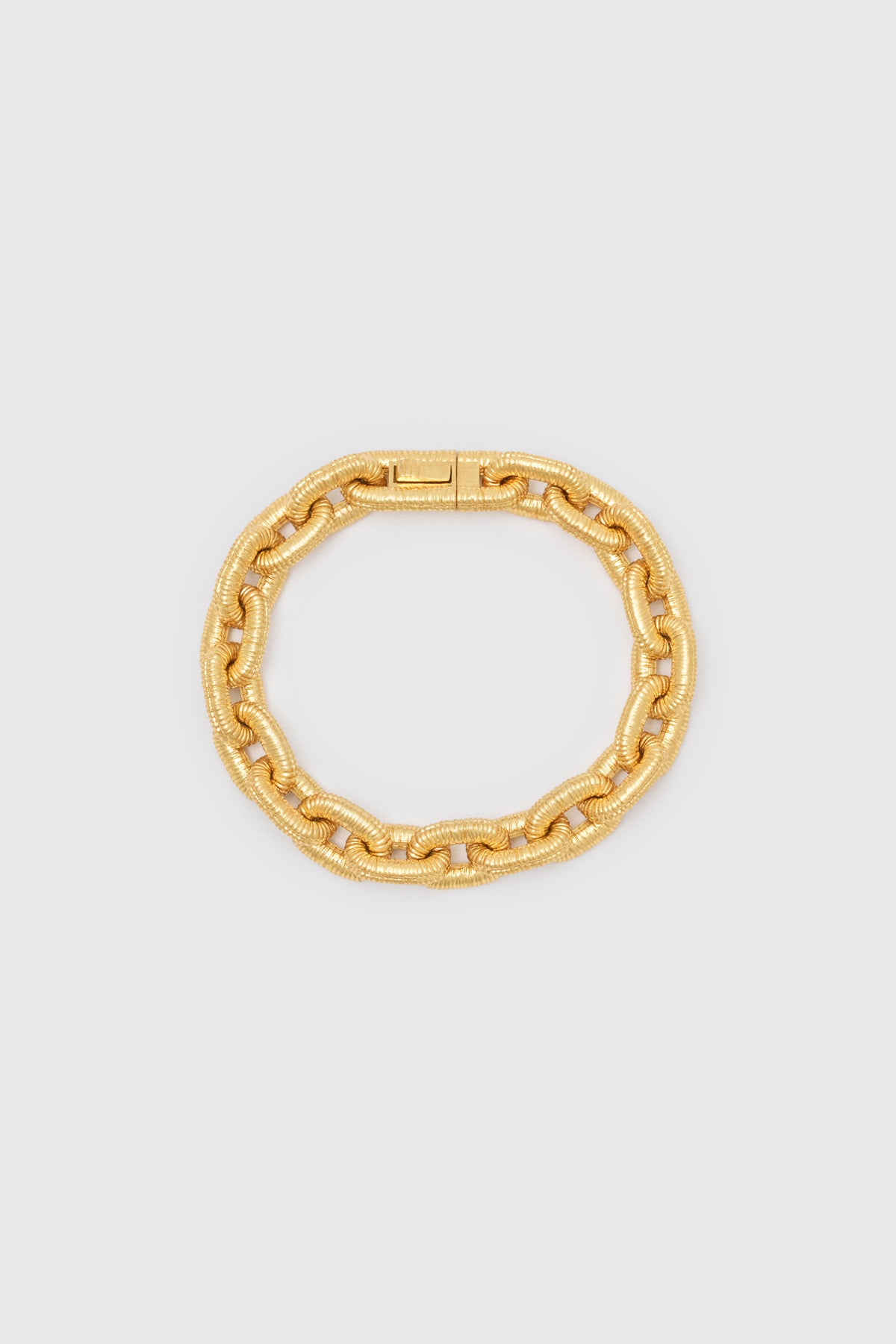 Ghost view CAMILLA AND MARC Eagan Bracelet in gold with handcrafted ruched chain links in solid brass.