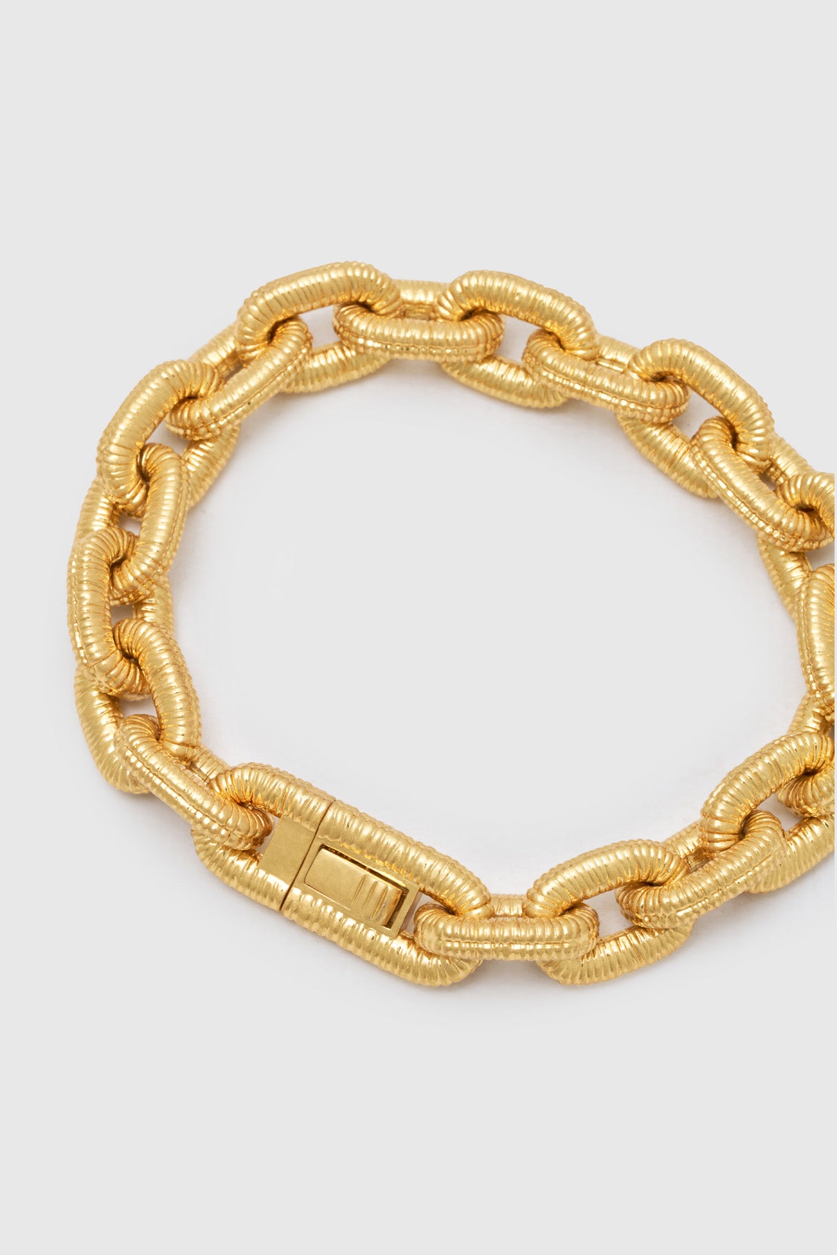 Ghost view CAMILLA AND MARC Eagan Bracelet in gold with handcrafted ruched chain links in solid brass.
