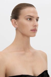 Side view CAMILLA AND MARC Eagan Huggies in silver with square huggie design and ruched texture.