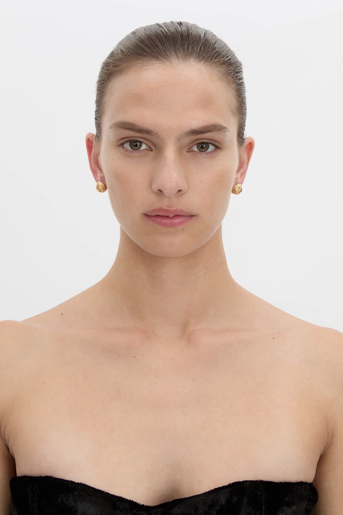 Front view CAMILLA AND MARC Eagan Studs in gold with petite semi‑sphere design and ruched texture.
