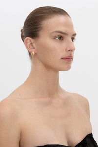 Side view CAMILLA AND MARC Eagan Studs in gold with petite semi‑sphere design and ruched texture.