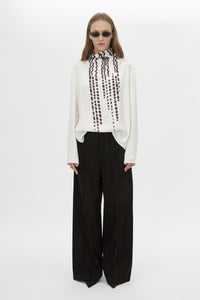 Front styled view CAMILLA AND MARC Edison Top in Edison Print with bespoke print and full long sleeves.