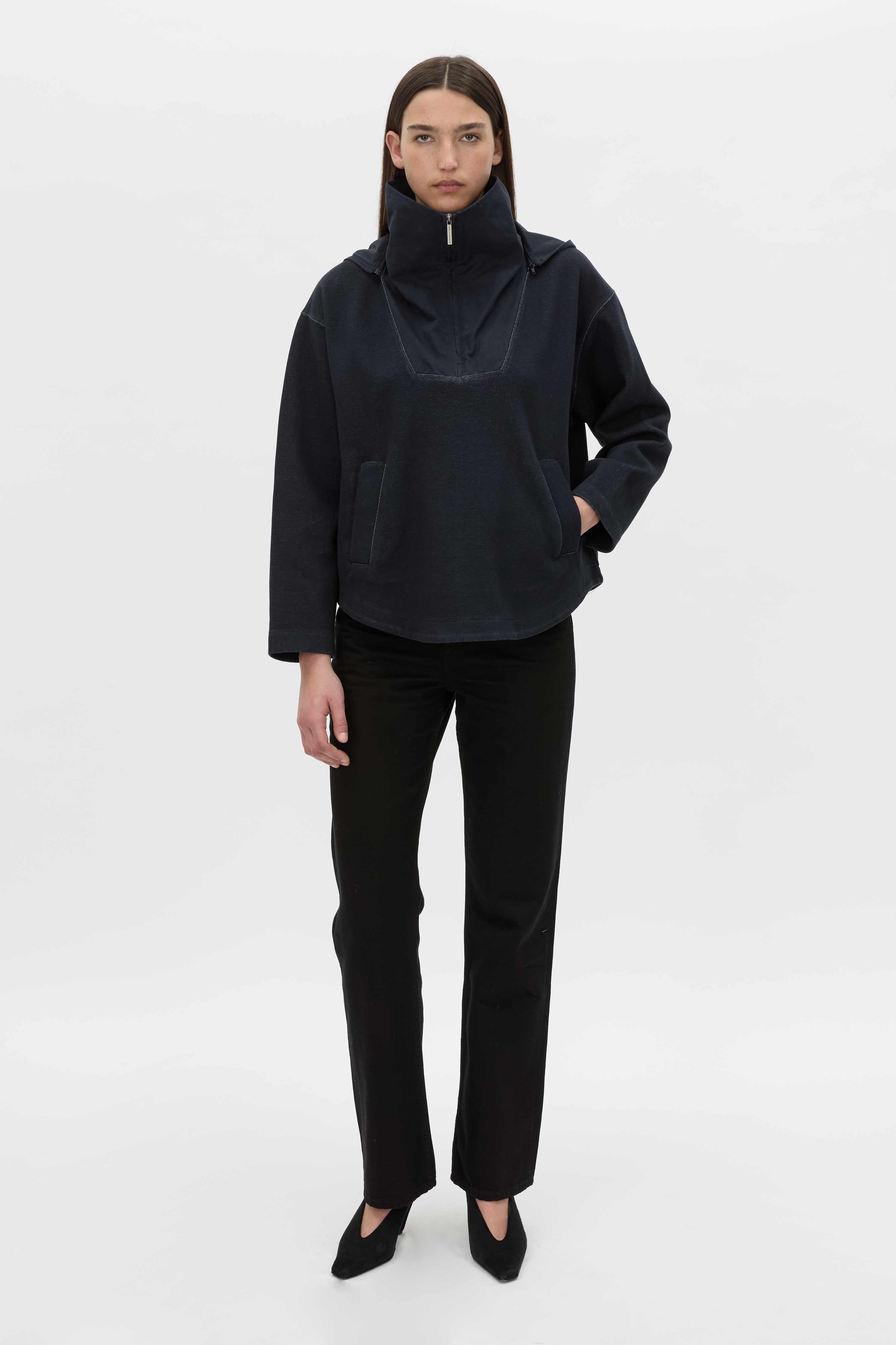 Front-styled view CAMILLA AND MARC Eira hooded pullover in navy.