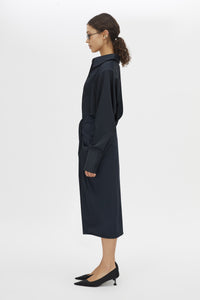 Side view CAMILLA AND MARC Elowyn Wrapped Midi Skirt in French Navy with front draped detailing.
