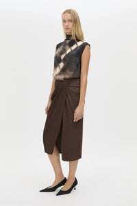 Three-quarter view CAMILLA AND MARC Elowyn Wrapped Midi Skirt in Espresso Brown with front draped detailing.
