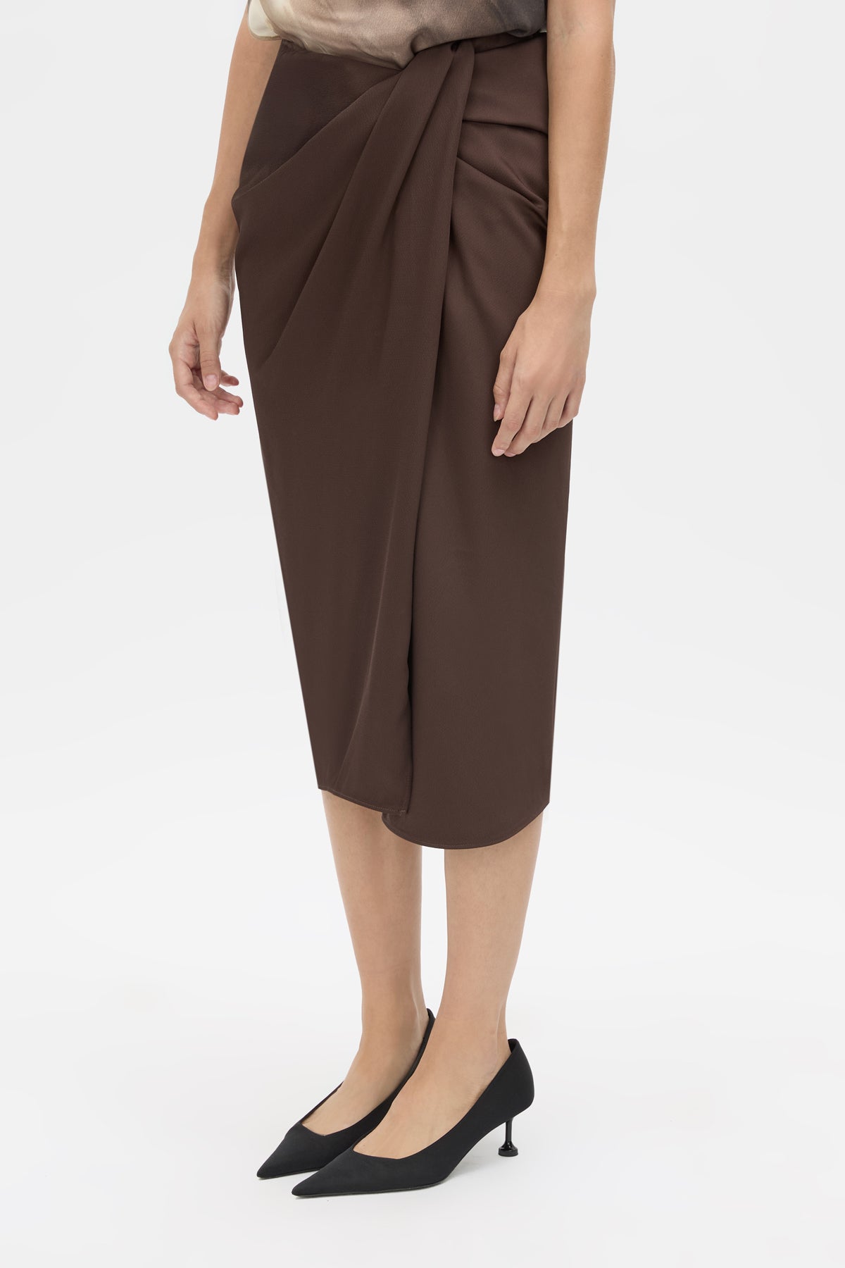 Cropped view CAMILLA AND MARC Elowyn Wrapped Midi Skirt in Espresso Brown with front draped detailing.