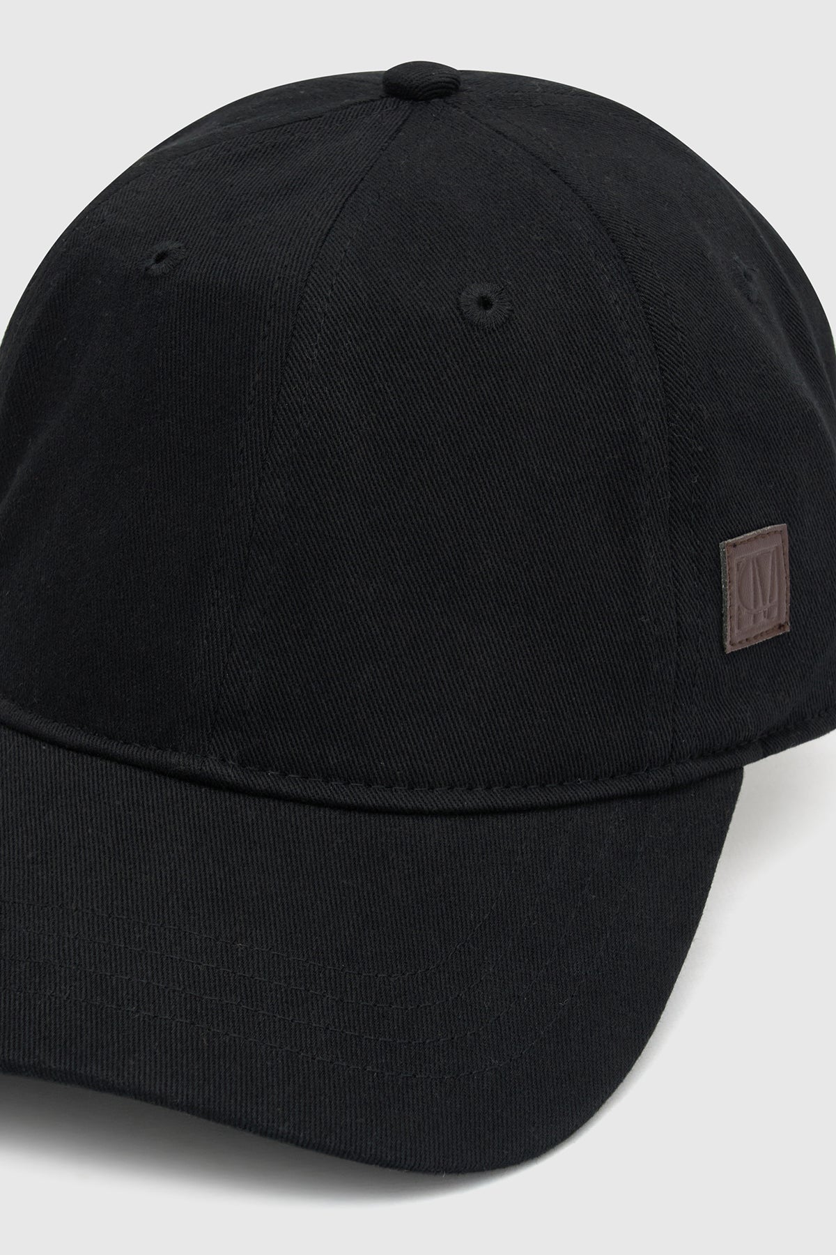 Emery Cap