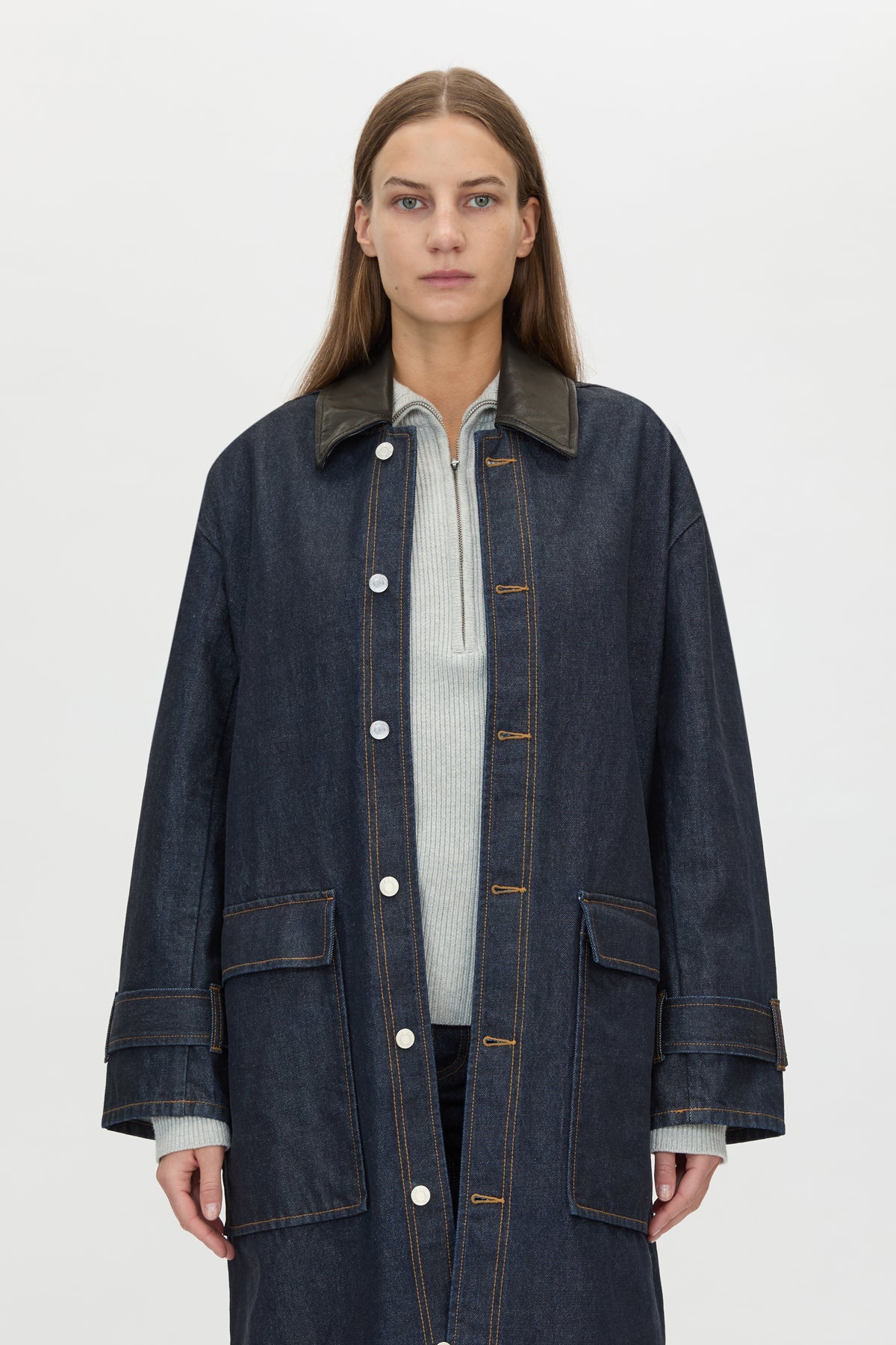 Cropped view CAMILLA AND MARC Enzo Denim Coat in Indigo Blue with a contrast leather collar and dual‑entry patch pockets.