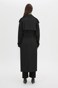 Back view CAMILLA AND MARC Evans classic trench coat in black in twill fabrication.