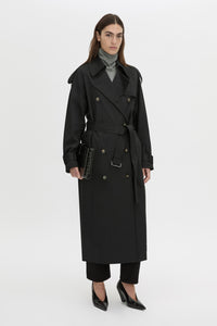 Front-styled view CAMILLA AND MARC Evans classic trench coat in black in twill fabrication.