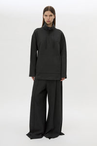 Front view CAMILLA AND MARC Figura Sweater in Coal Grey with cropped fleece, pullover design and quarter zip. 