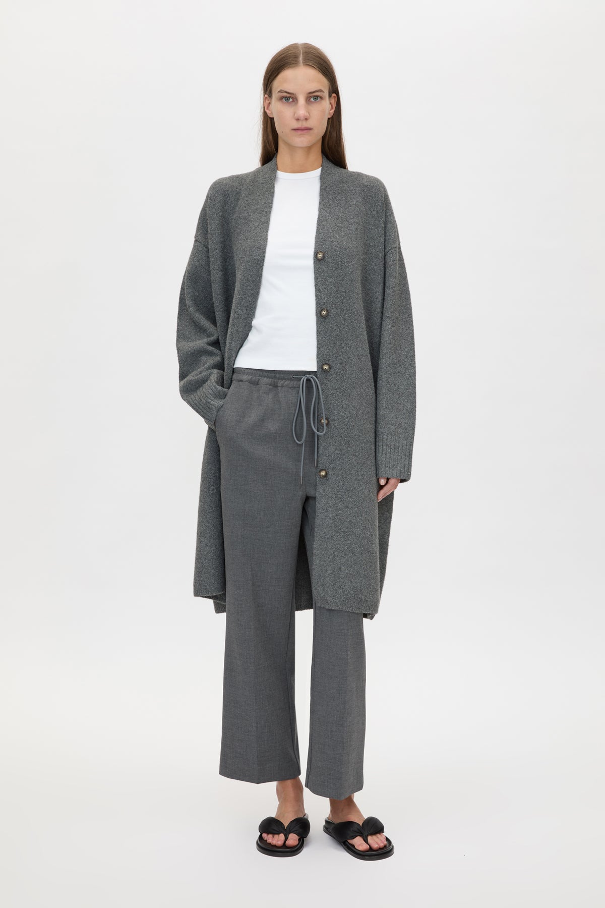 Front styled view CAMILLA AND MARC Francis Knit Long Cardigan in Caramel with rib front button placket.