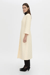 Side view CAMILLA AND MARC Gracia coat in cream.