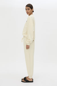 Side view CAMILLA AND MARC Idris Tracksuit Top in Ecru with folded rib crew neckline.