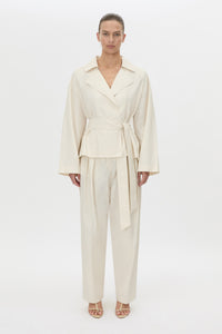 Front-styled view CAMILLA AND MARC Inca Belted Wrap Jacket in ivory.