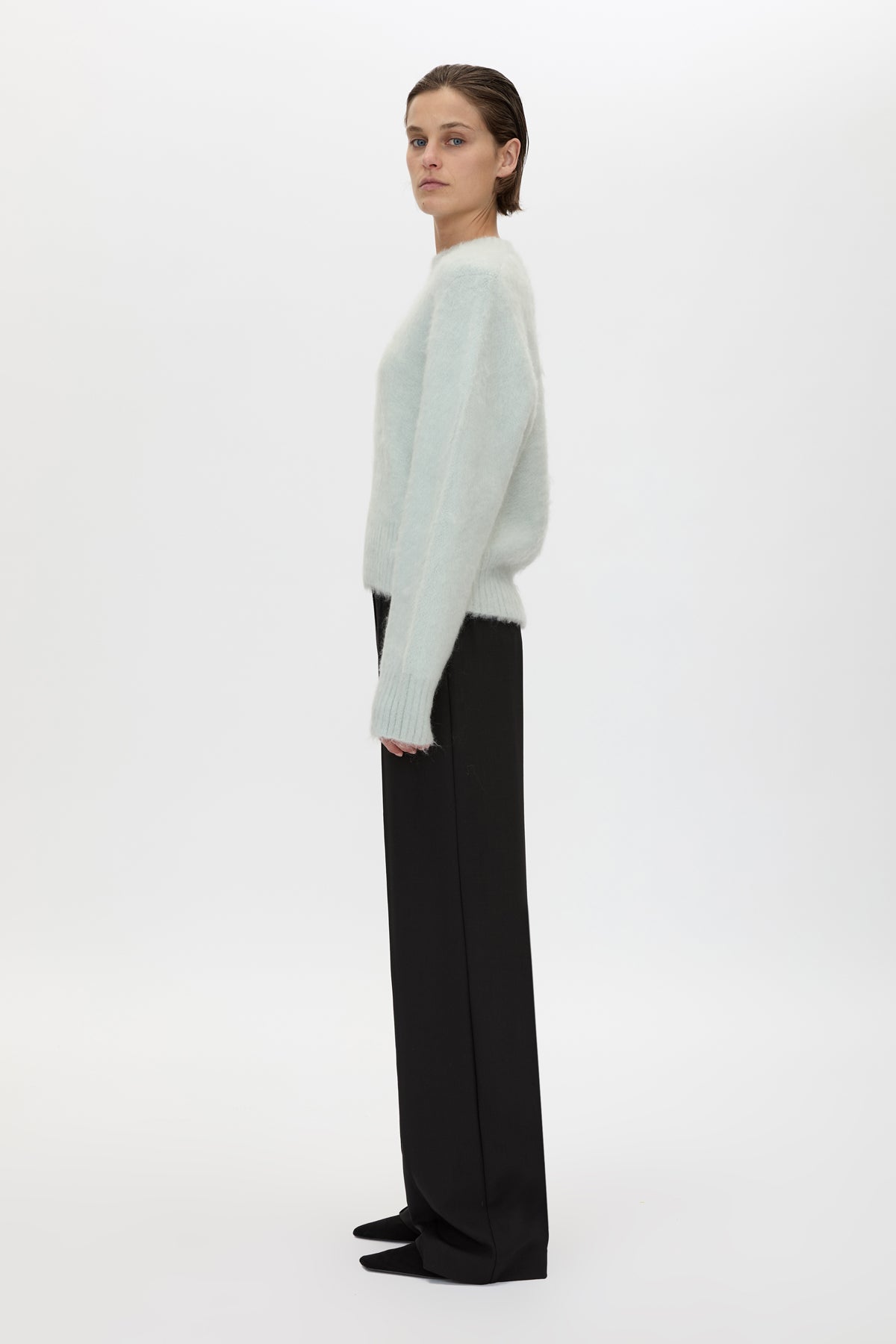 Side view CAMILLA AND MARC Ines Knit Sweater in Mint with brushed knit texture and ribbed crew neckline.