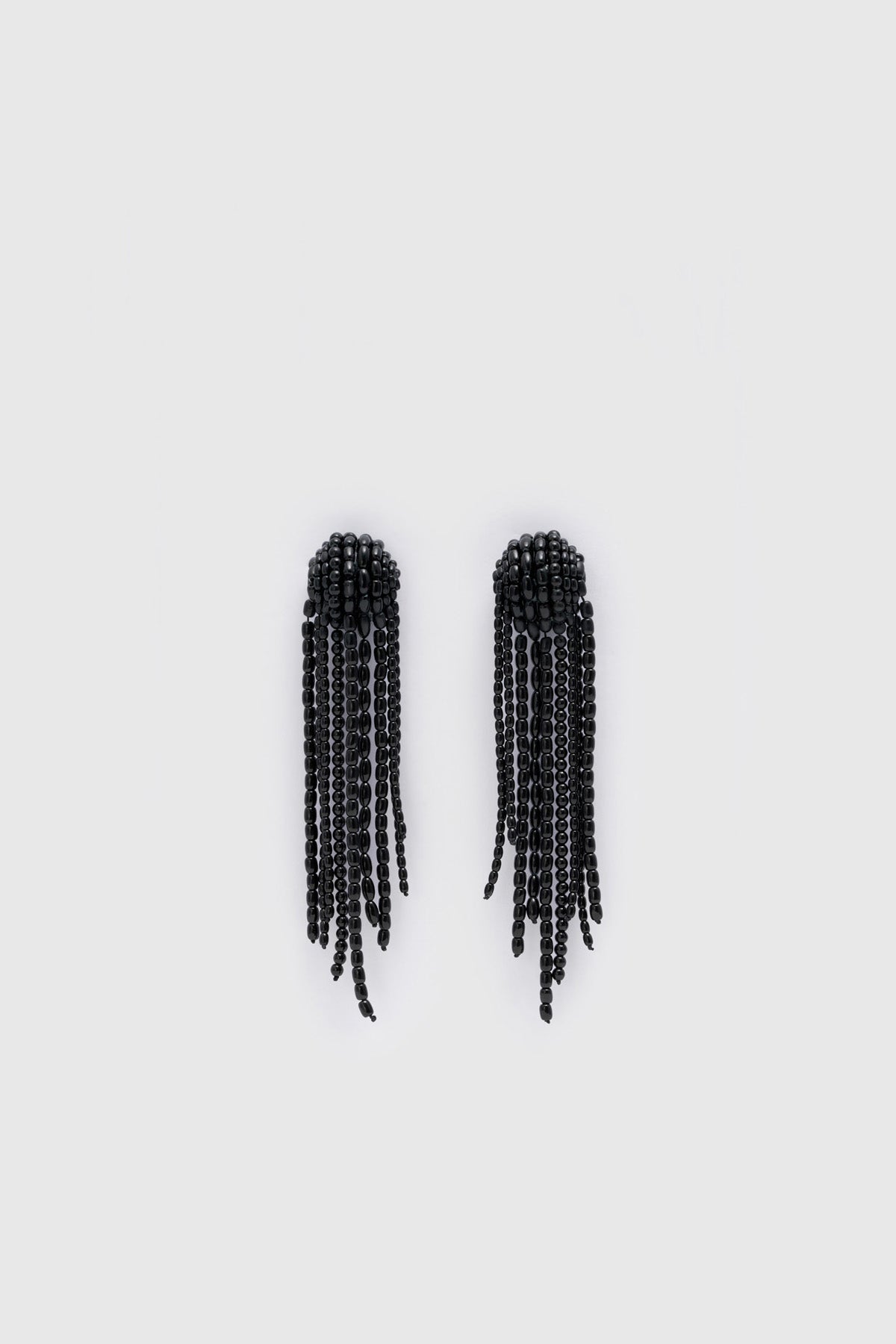Ghost view CAMILLA AND MARC Irida Drop Earrings in black with glossy beaded drop design.