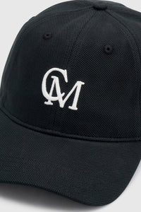 Cropped view CAMILLA AND MARC Isolde Embroidered Logo Cap in Black and White with front embroidered artwork.