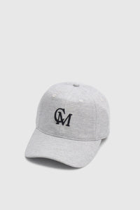 Three-quarter view CAMILLA AND MARC Isolde Embroidered Logo Cap in Grey Marle and black with front embroidered artwork.