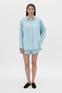 Front-styled view CAMILLA AND MARC Jenie stripe shirt in baby blue stripe.