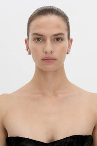 Front view CAMILLA AND MARC Leighton Pavé Huggies in silver with double‑row pavé cubic zirconia detailing.