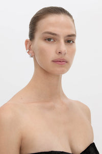 Side view CAMILLA AND MARC Leighton Pavé Huggies in silver with double‑row pavé cubic zirconia detailing.