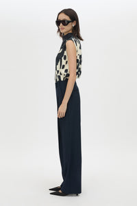 Side view CAMILLA AND MARC Lena Pant in Navy featuring a mid‑rise tailored cut with front tucks.