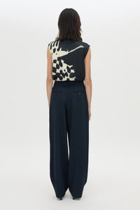 Back view CAMILLA AND MARC Lena Pant in Navy featuring a mid‑rise tailored cut with front tucks.