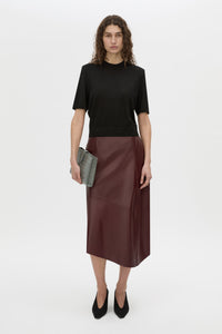 Front-styled view CAMILLA AND MARC Leona knit T shirt in black.