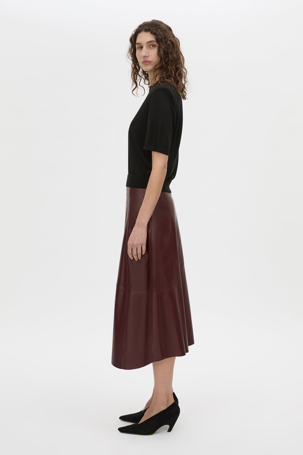 Side view CAMILLA AND MARC Leona knit T shirt in black.