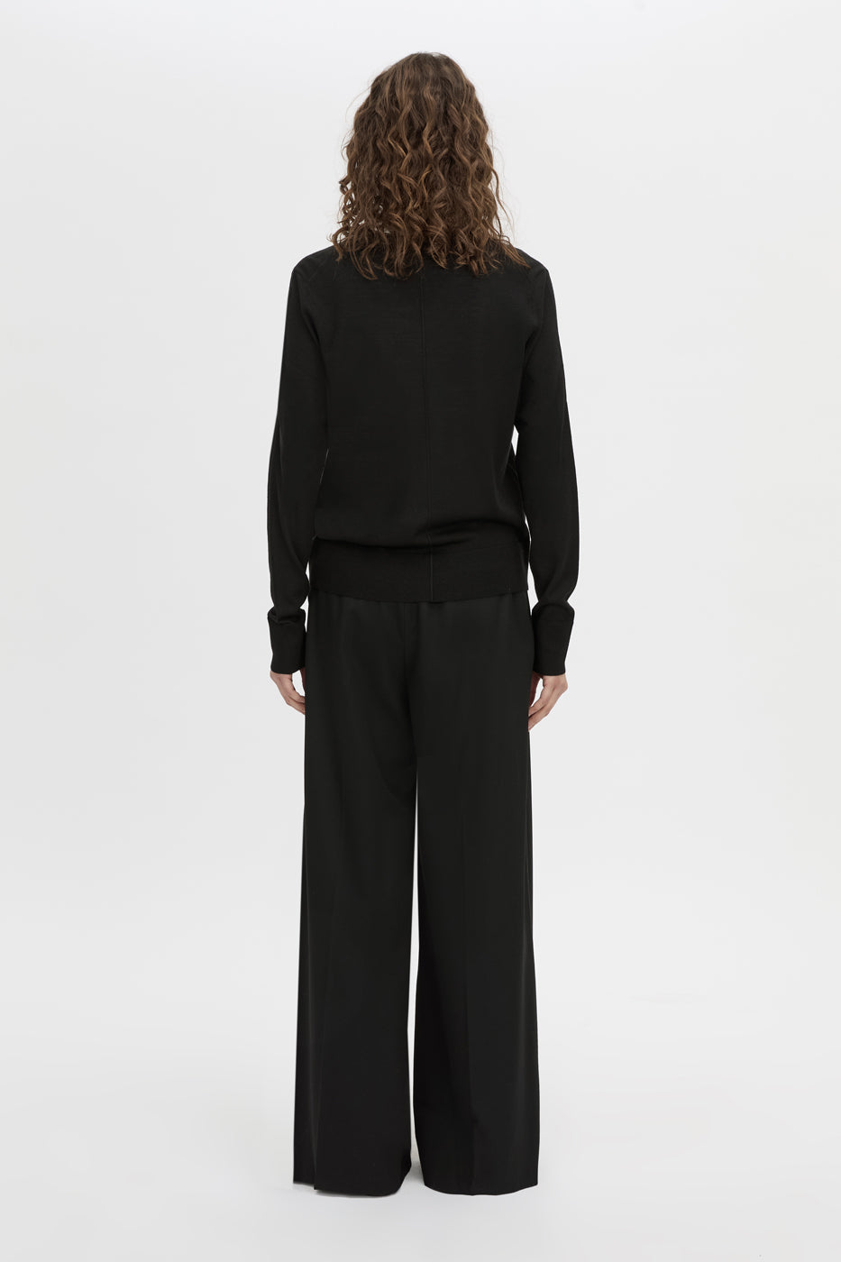 Back view CAMILLA AND MARC Leona V neck sweater in black.
